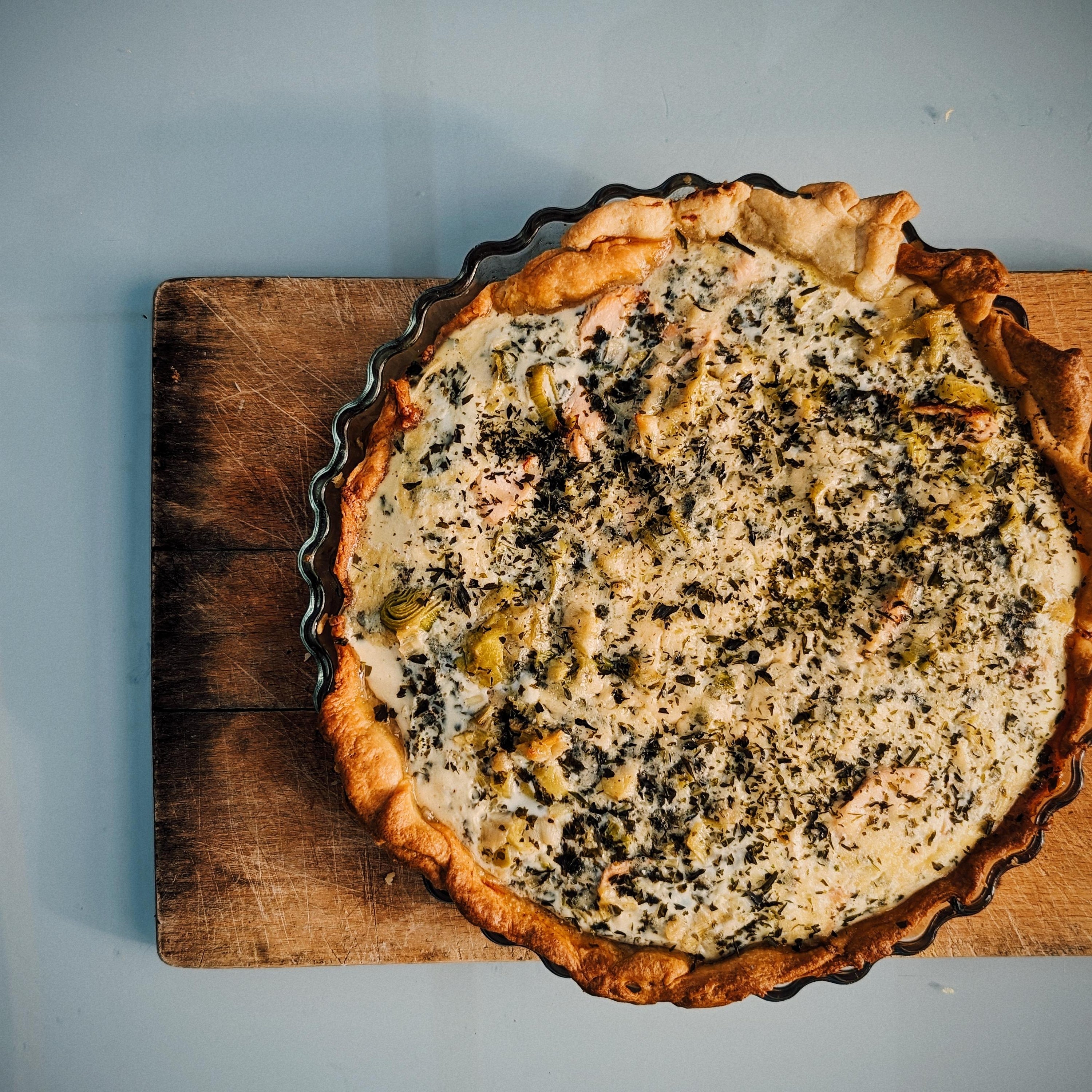 Salmon, laverbread, leek and smoked cheese quiche